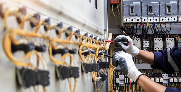 Professional Electrician technician working in Bon Secour, AL